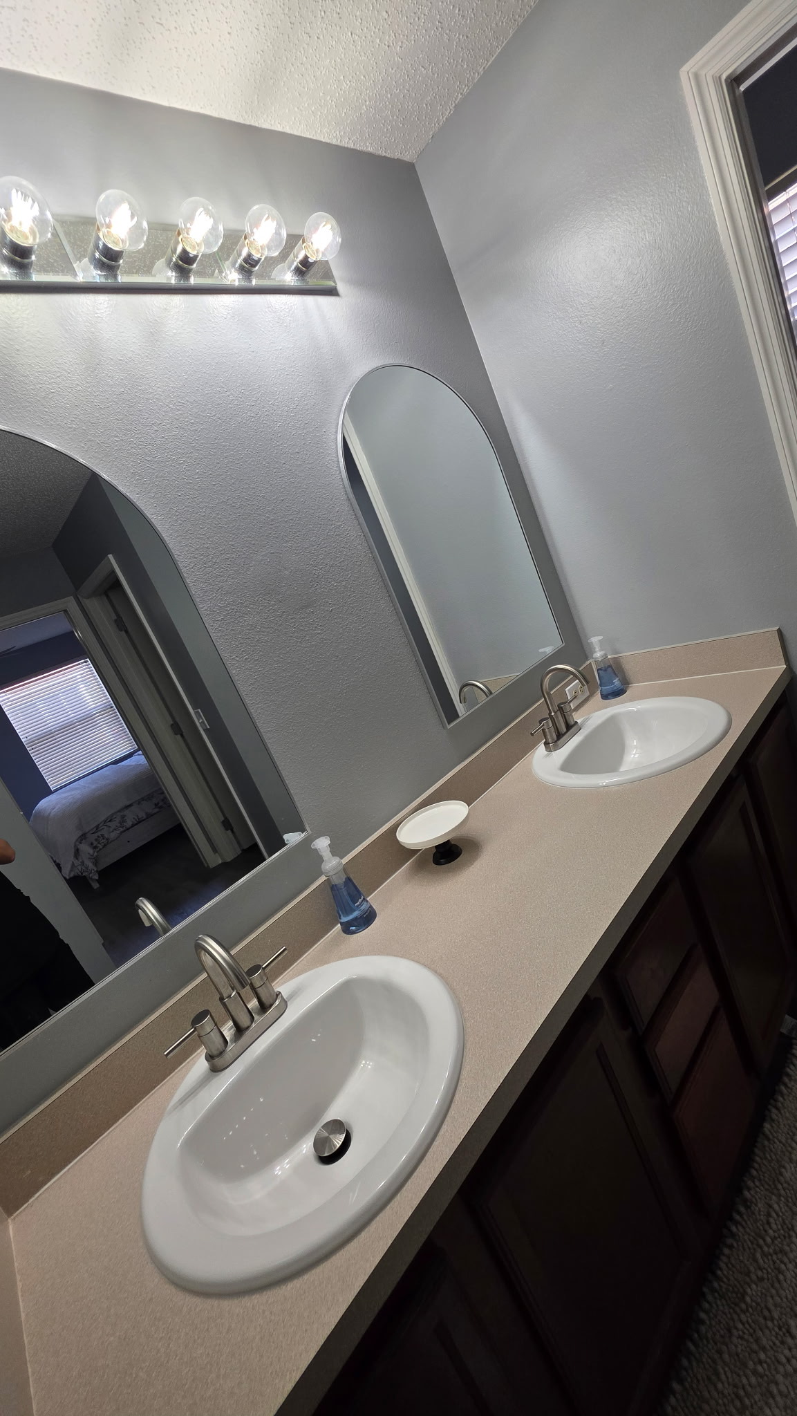 Sparkling bathroom vanity cleaned by Palma