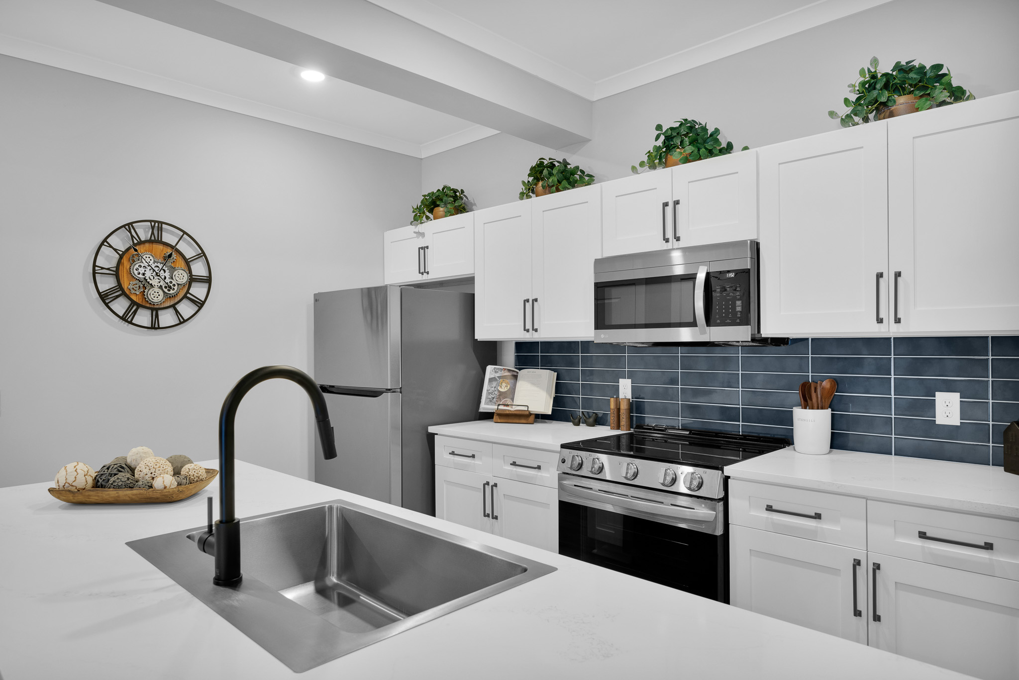 a person carefully washing a glass plate in a clean kitchen sink, close-up shot, professional cleaning service photo