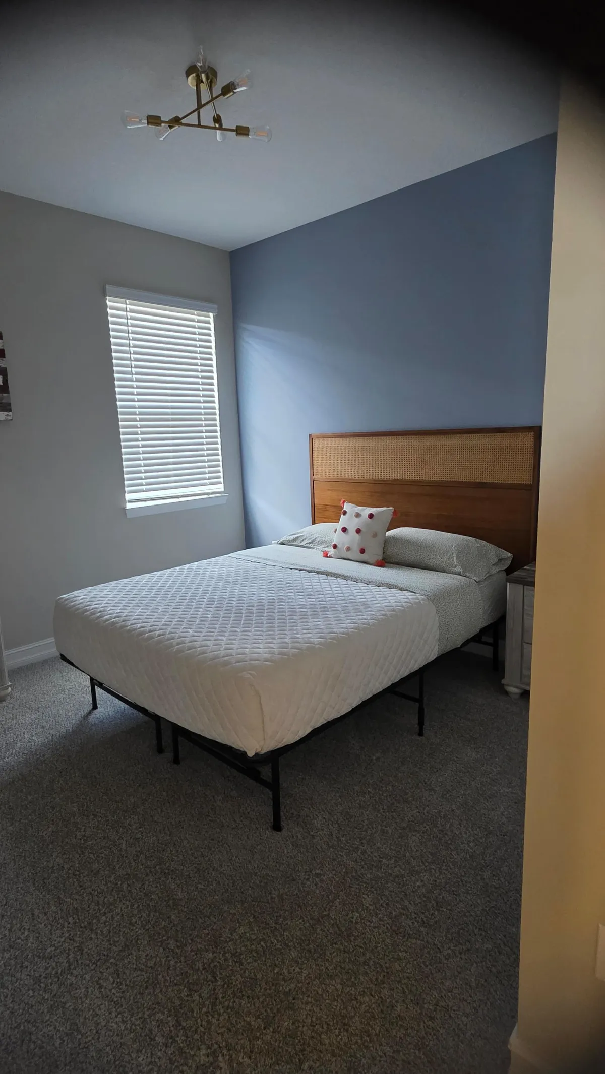 Bedroom with accent wall after cleaning in Marion County