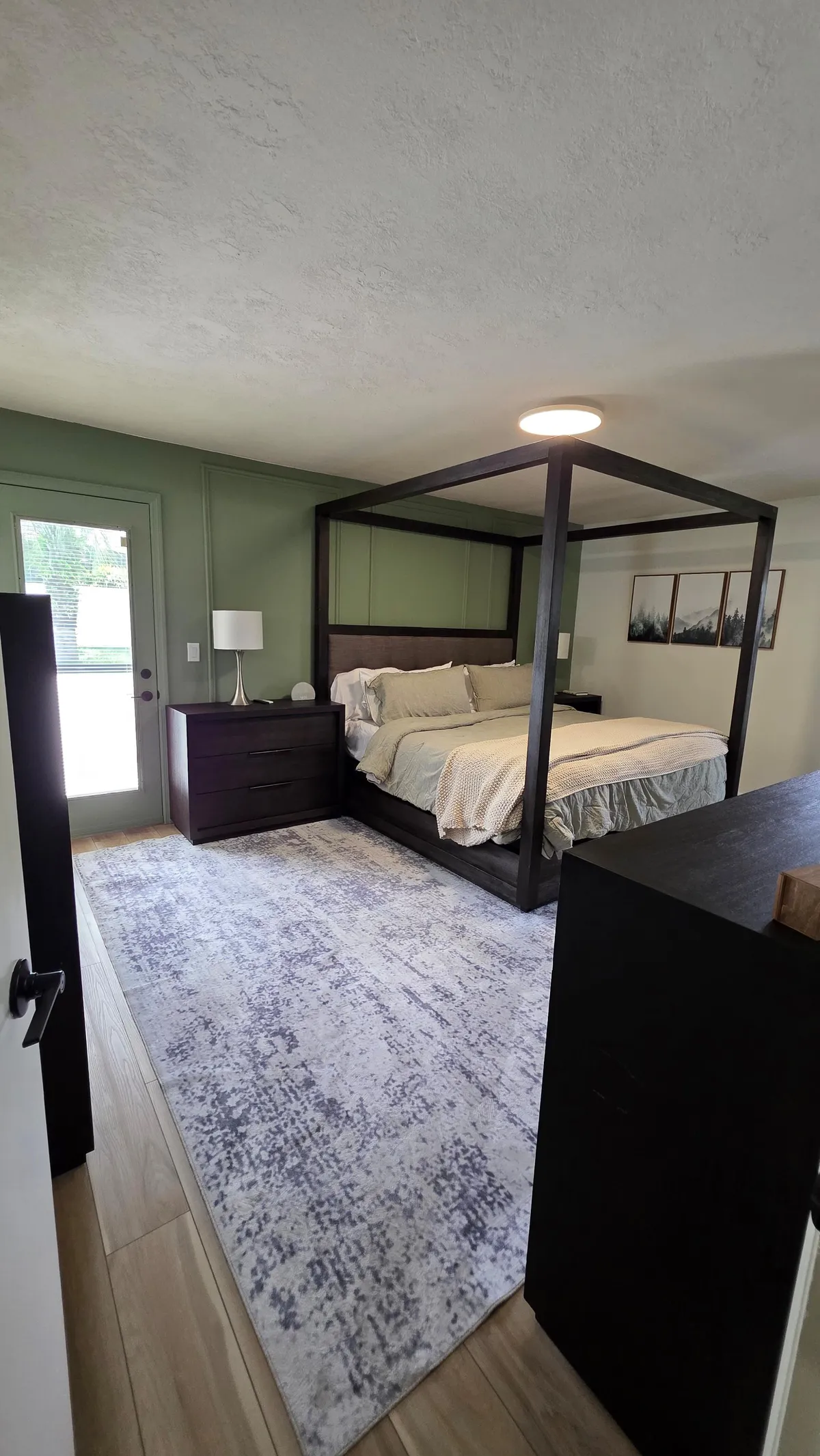 Canopy bed master bedroom after cleaning in Ocala