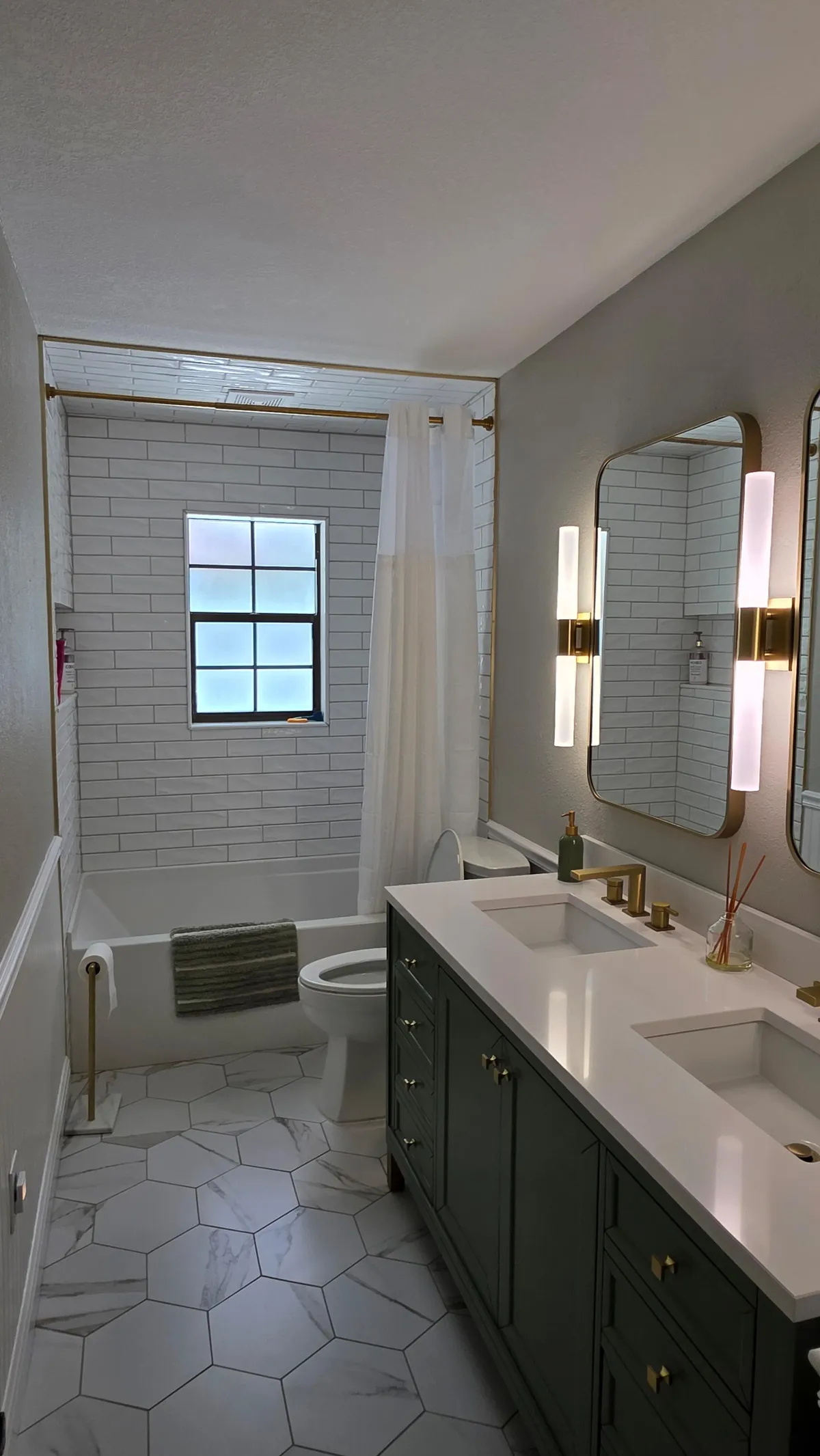 Designer bathroom with dual vanity after cleaning in Ocala