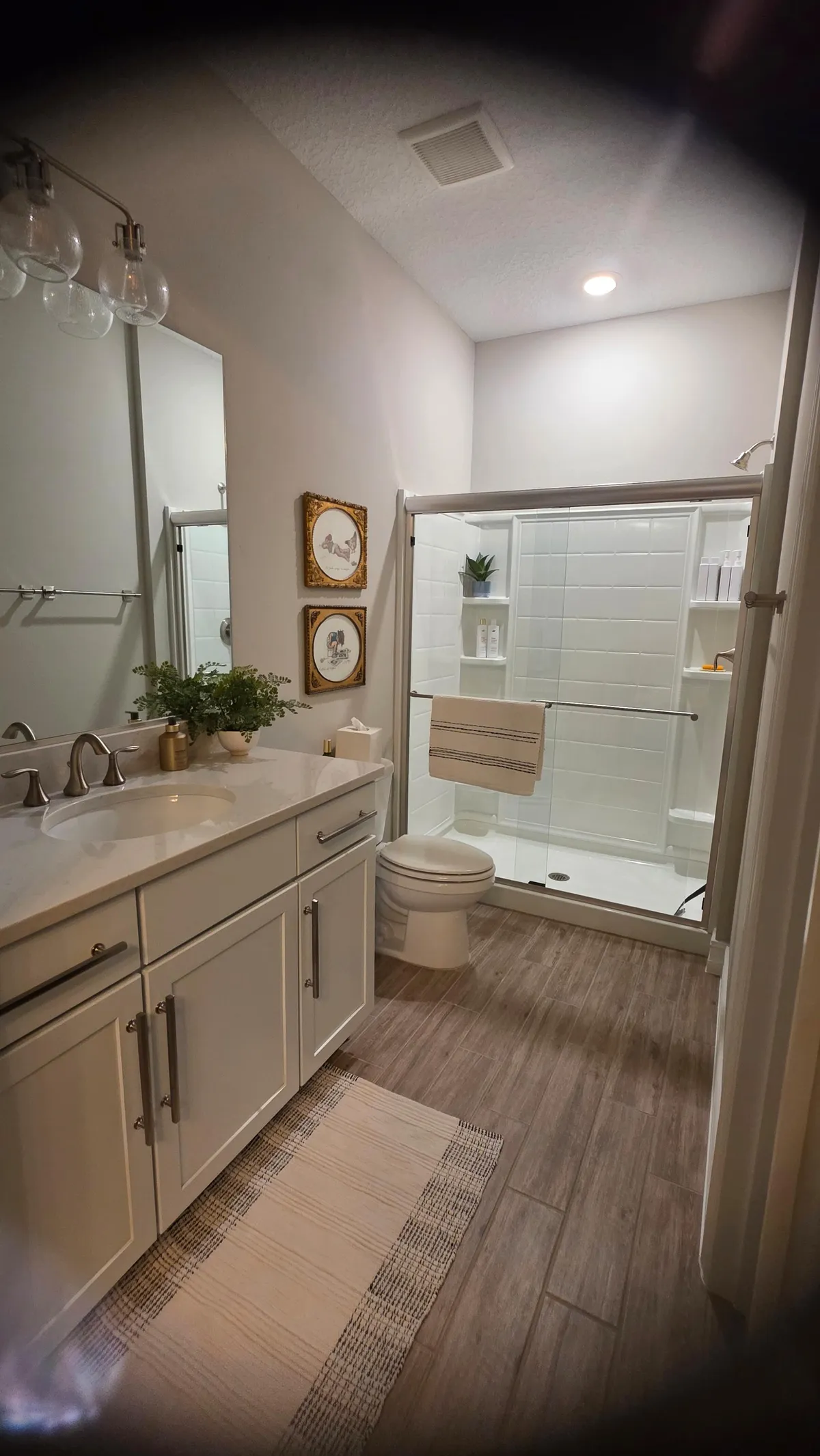 Guest bath with glass shower after cleaning in Marion County
