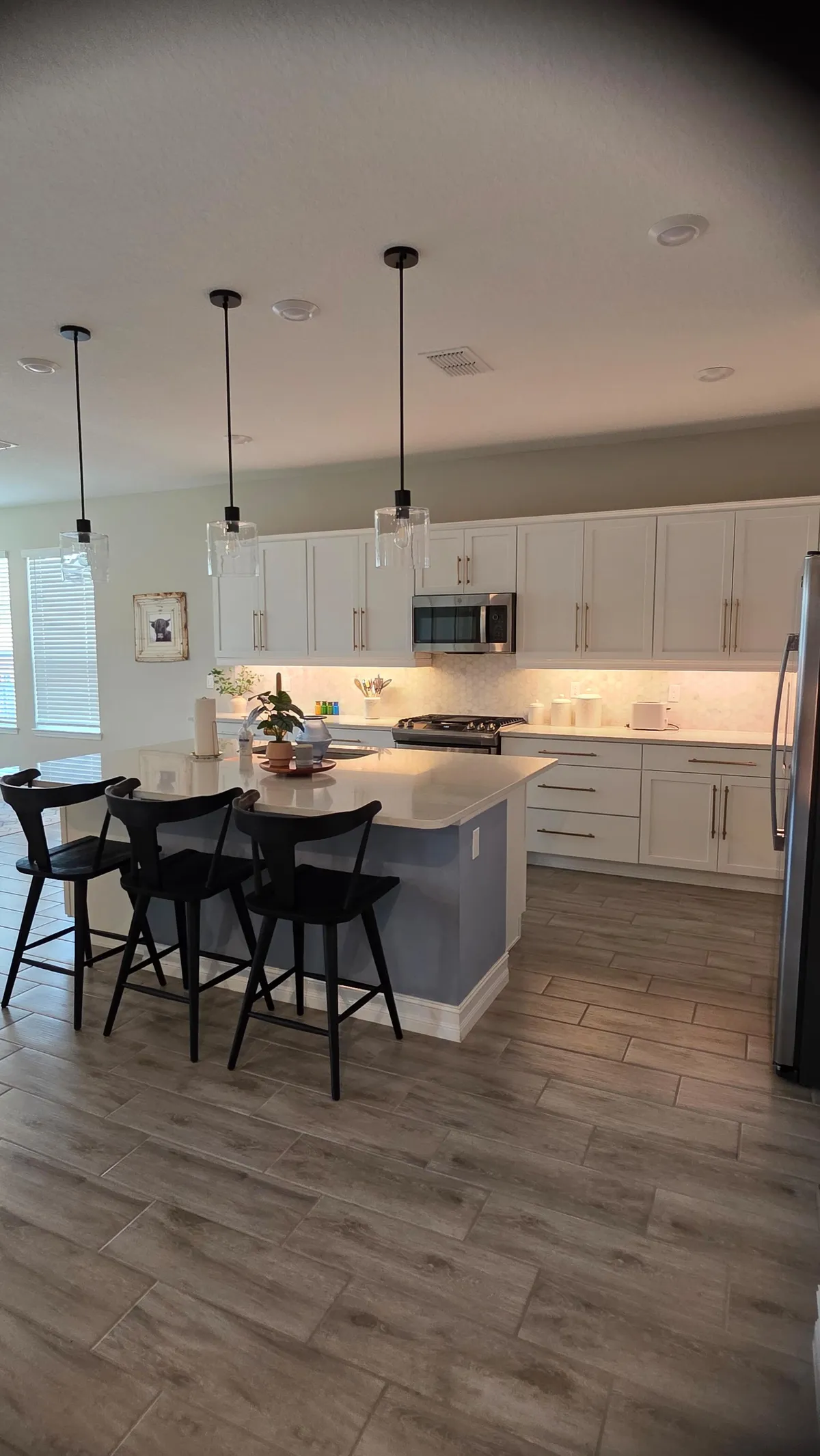 Kitchen island with pendant lights after cleaning
