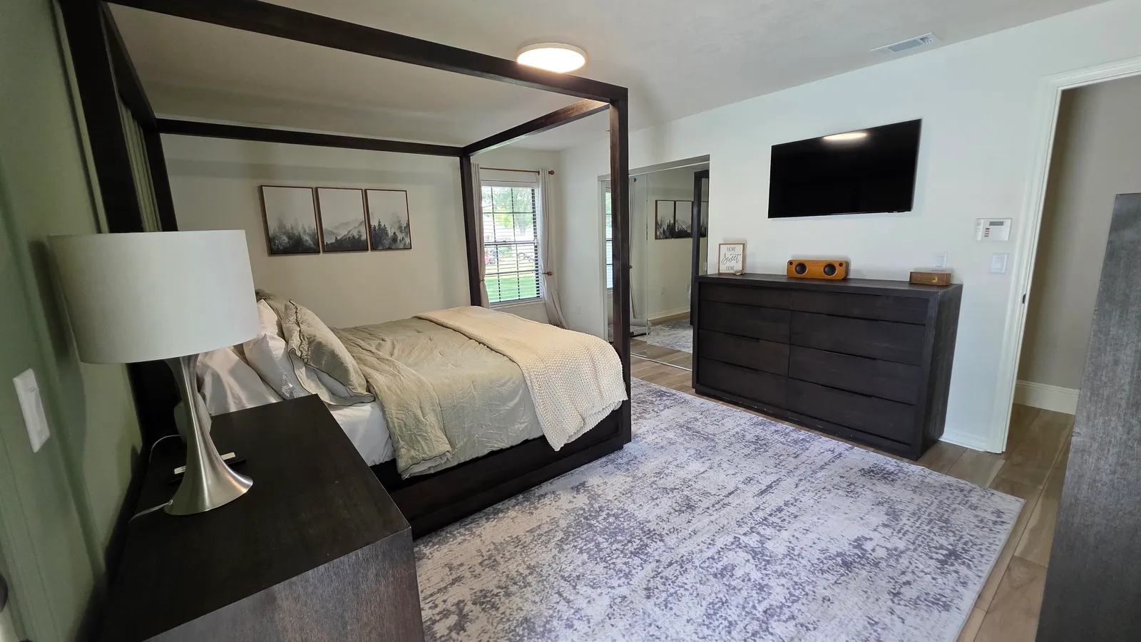 Bedroom with canopy bed after cleaning in Marion County