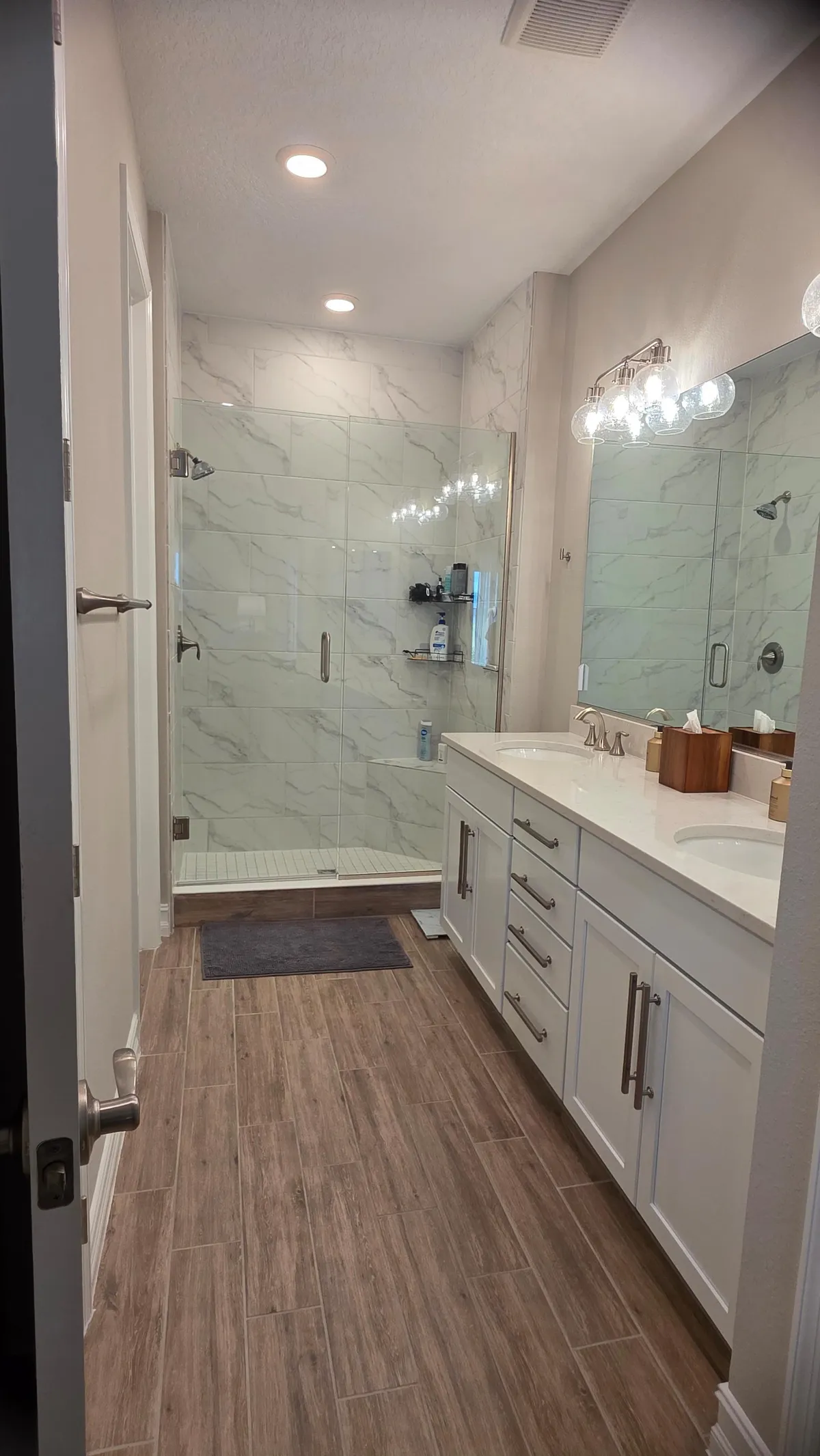 Walk-in shower after deep cleaning in an Ocala home